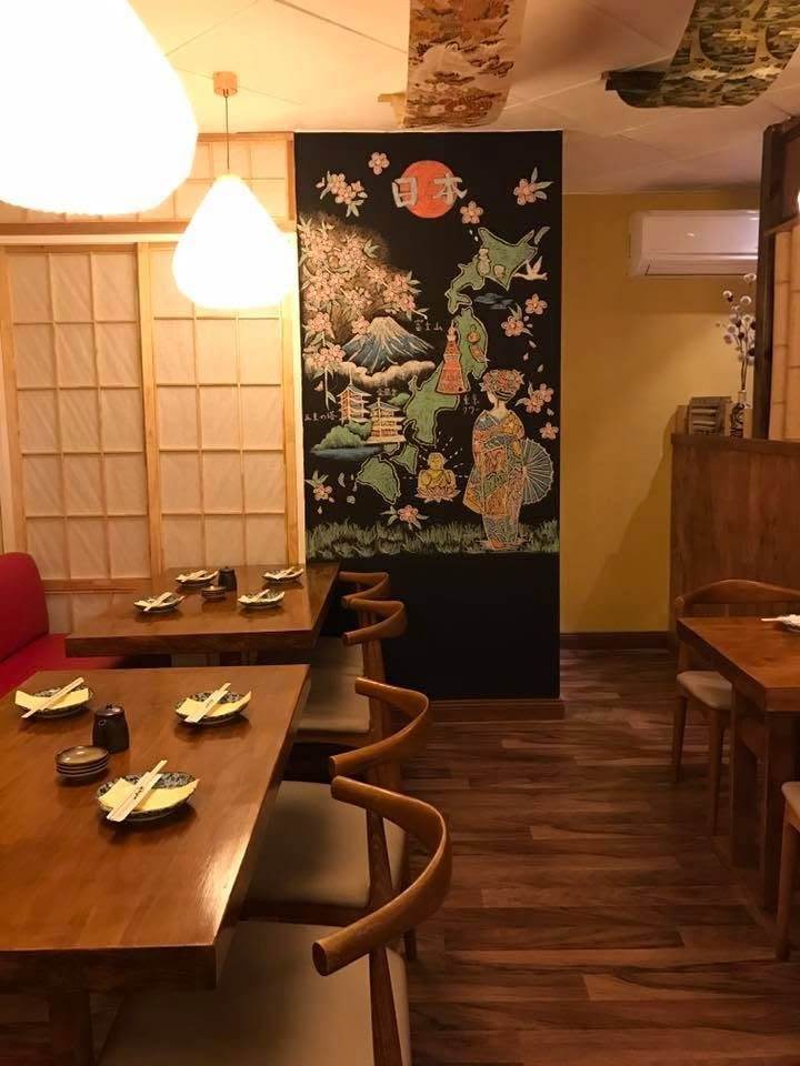 Bamboo screen and red-lit partition in the dining room