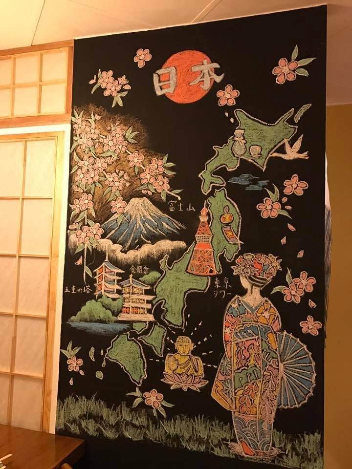 Red-lit bamboo screen in the dining room